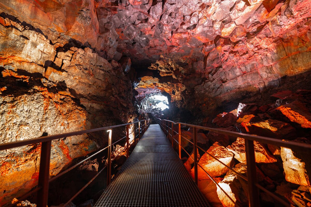 Metal walkway inside the Raufarhólshellir lava tube cave in Iceland.